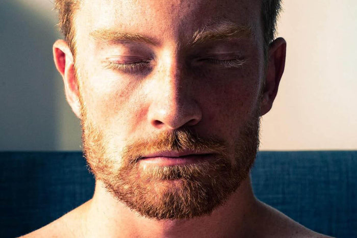Close-up of man meditating 
