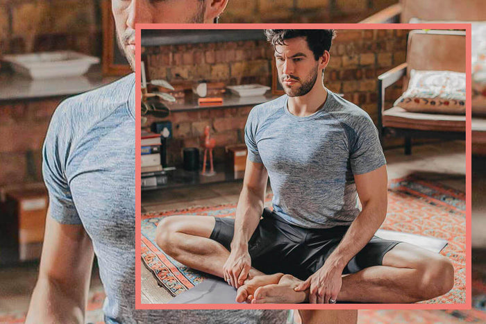 Adam Husler doing yoga stretch with Innermost