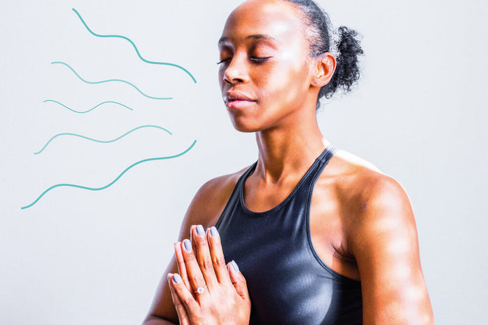 Woman practicing breathing exercise 