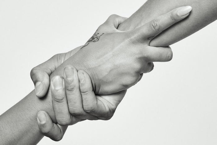 Hand in hand supporting black lives matter