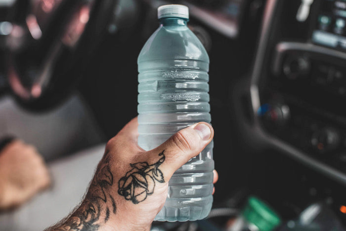 Man holding water bottle