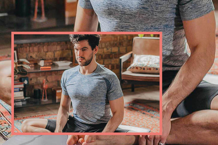 Jake Paul White doing yoga pose indoors