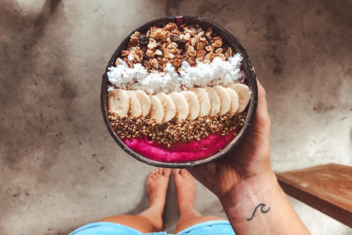 Woman holding smoothie bowl 