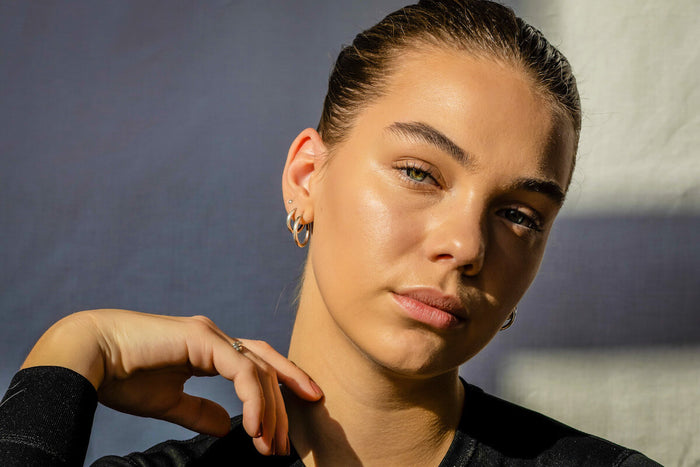 Woman with glowing skin by Innermost 