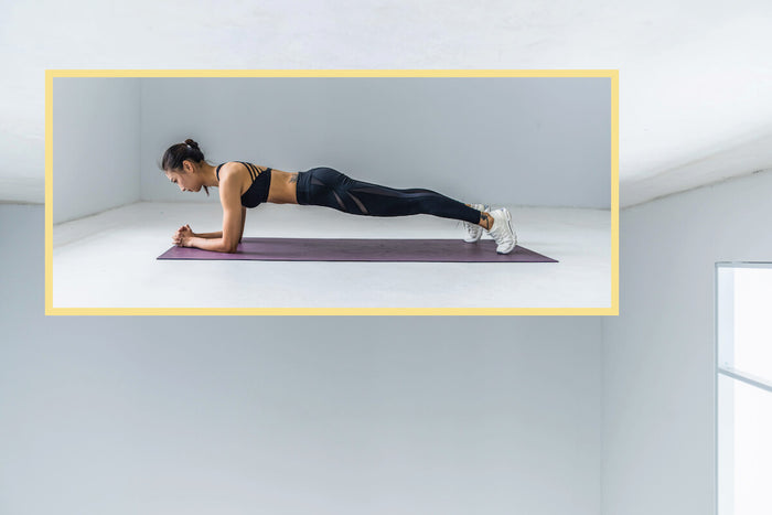 Woman holding the perfect plank 