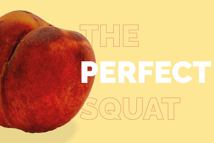 Woman squatting with weights on glute muscles