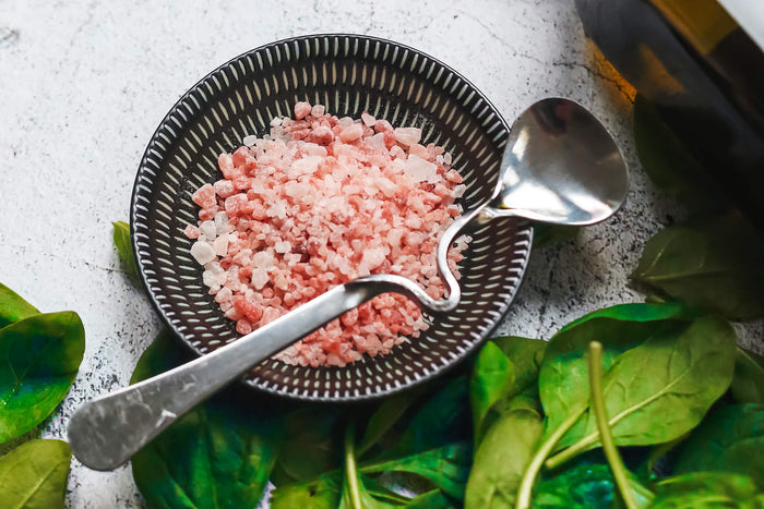 Pink Himalayan salt with leaves 