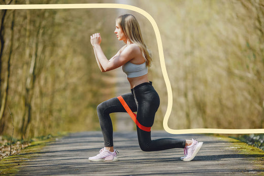 Woman doing lunges outdoors