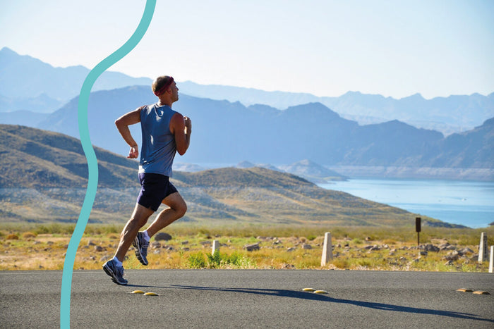Man running outdoors by coast