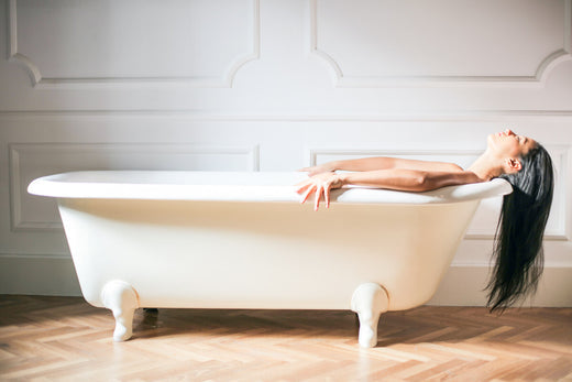 Woman in the bath for self-care