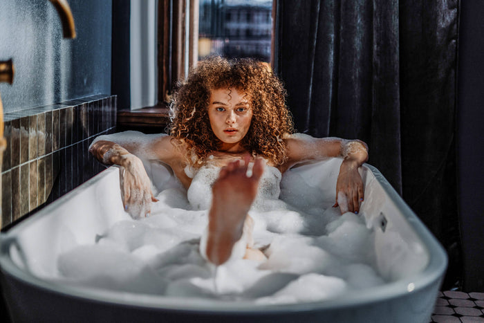 Woman in the bath relaxing 