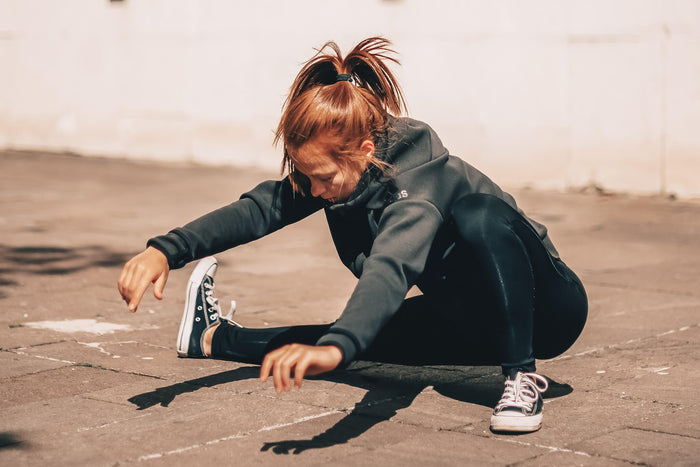 Women stretching glutes 