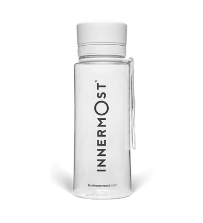 Innermost shaker bottle with a white lid and carry handle
