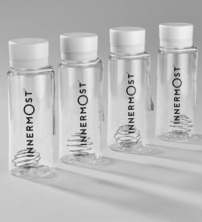 Four Innermost Tritan plastic shaker bottles in a row