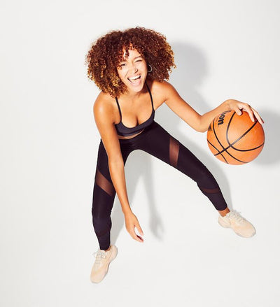 Lulu Stone bouncing a basketball for Innermost